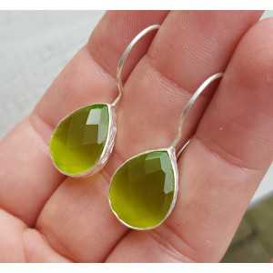 Silver earrings with drop shaped green cats eye