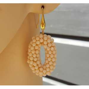 Earrings oval pendant of ivory colored crystals