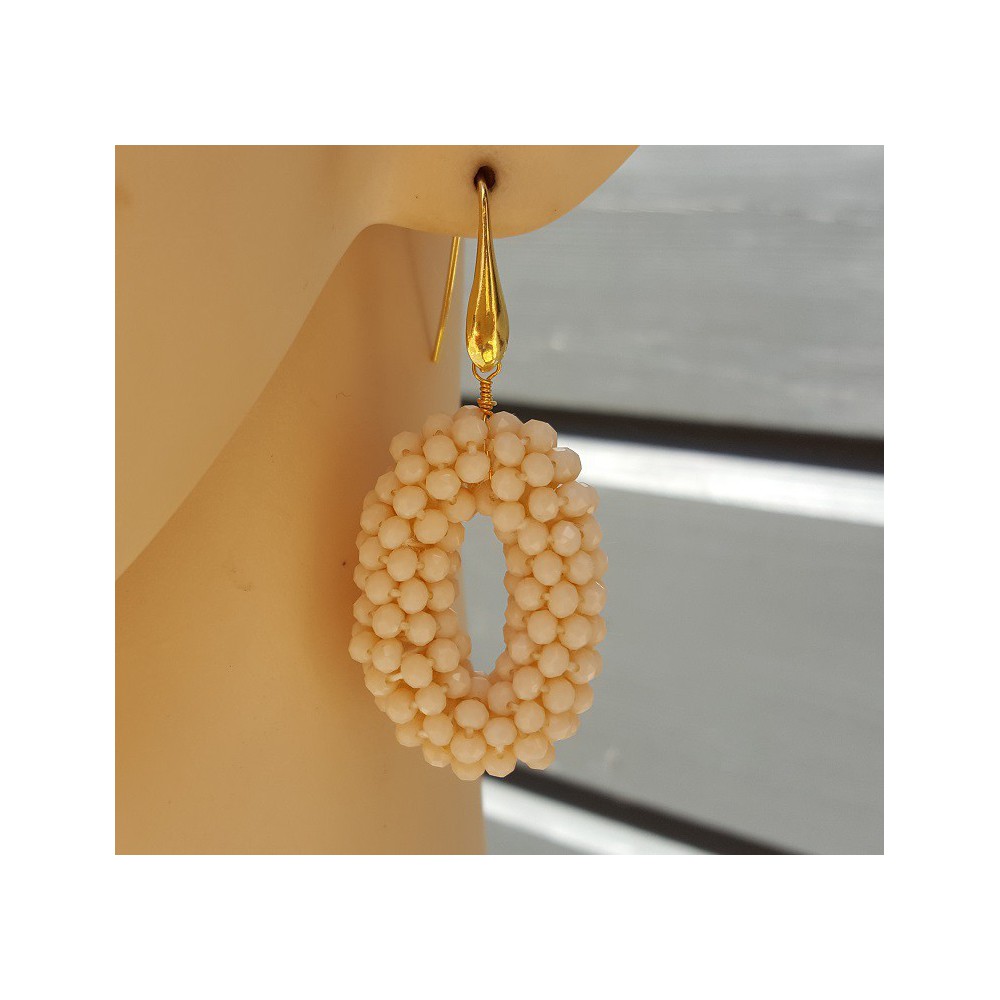 Earrings oval pendant of ivory colored crystals