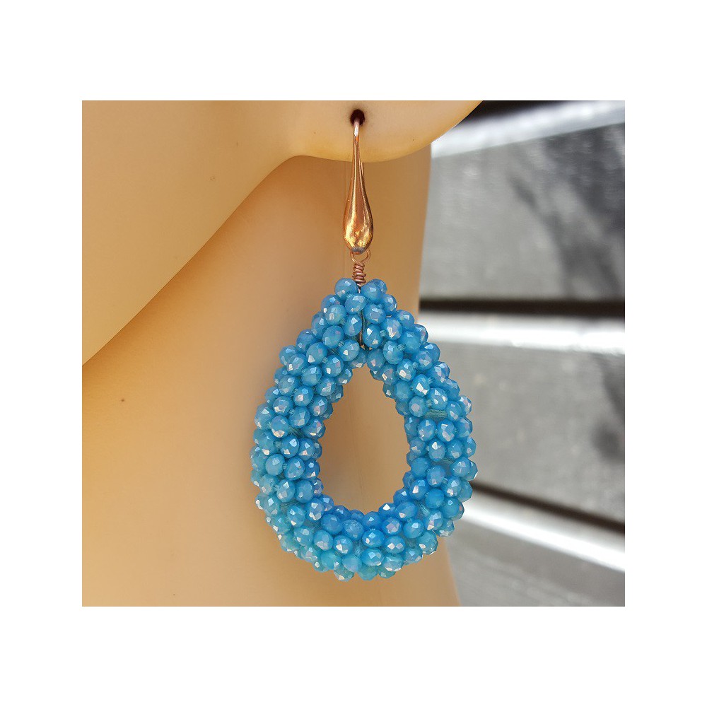 Earrings open drop of blue crystals