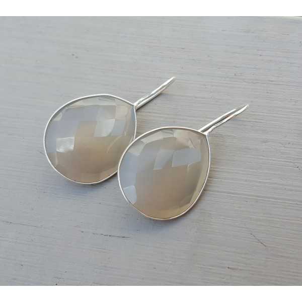 Silver earrings set with teardrop gray Chalcedony