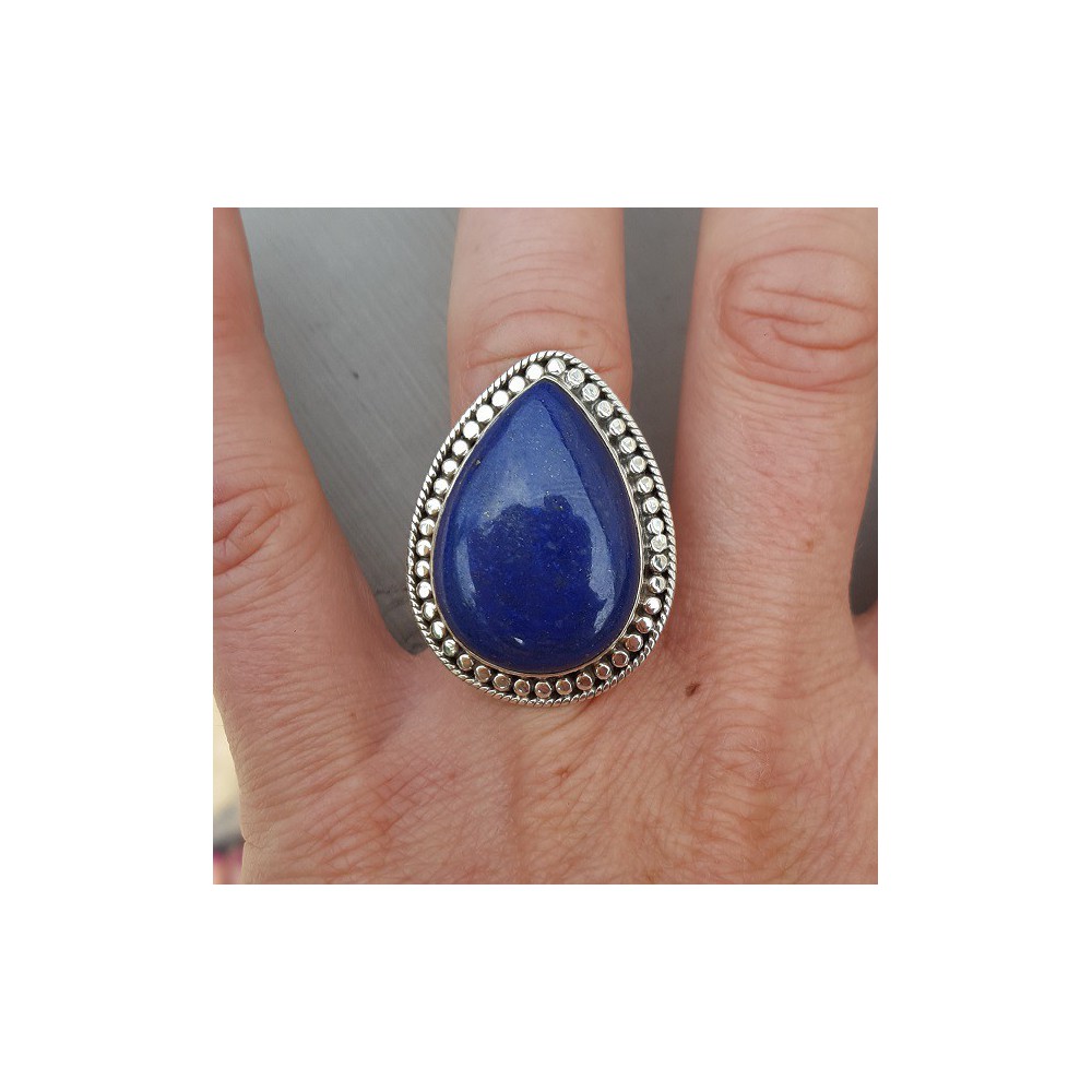 Silver ring set with oval Lapis Lazuli adjustable