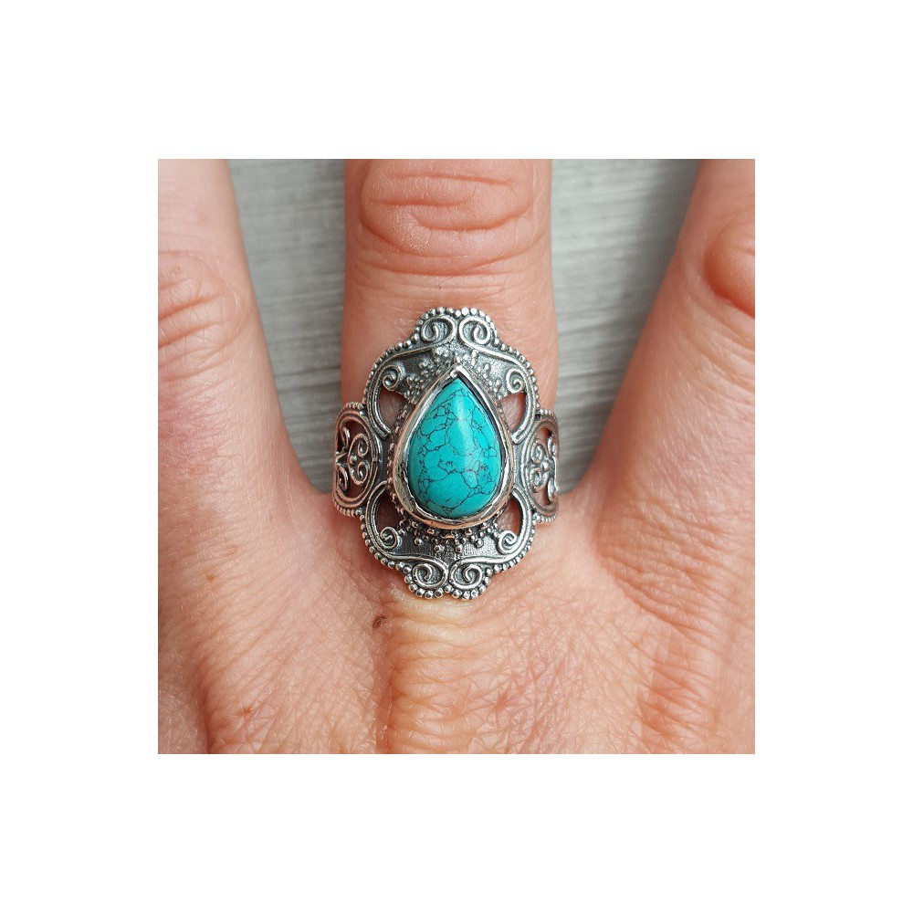 Silver ring set with Turquoise and carved head 18.5 