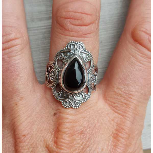 Silver ring set with black Onyx and carved head 17.7