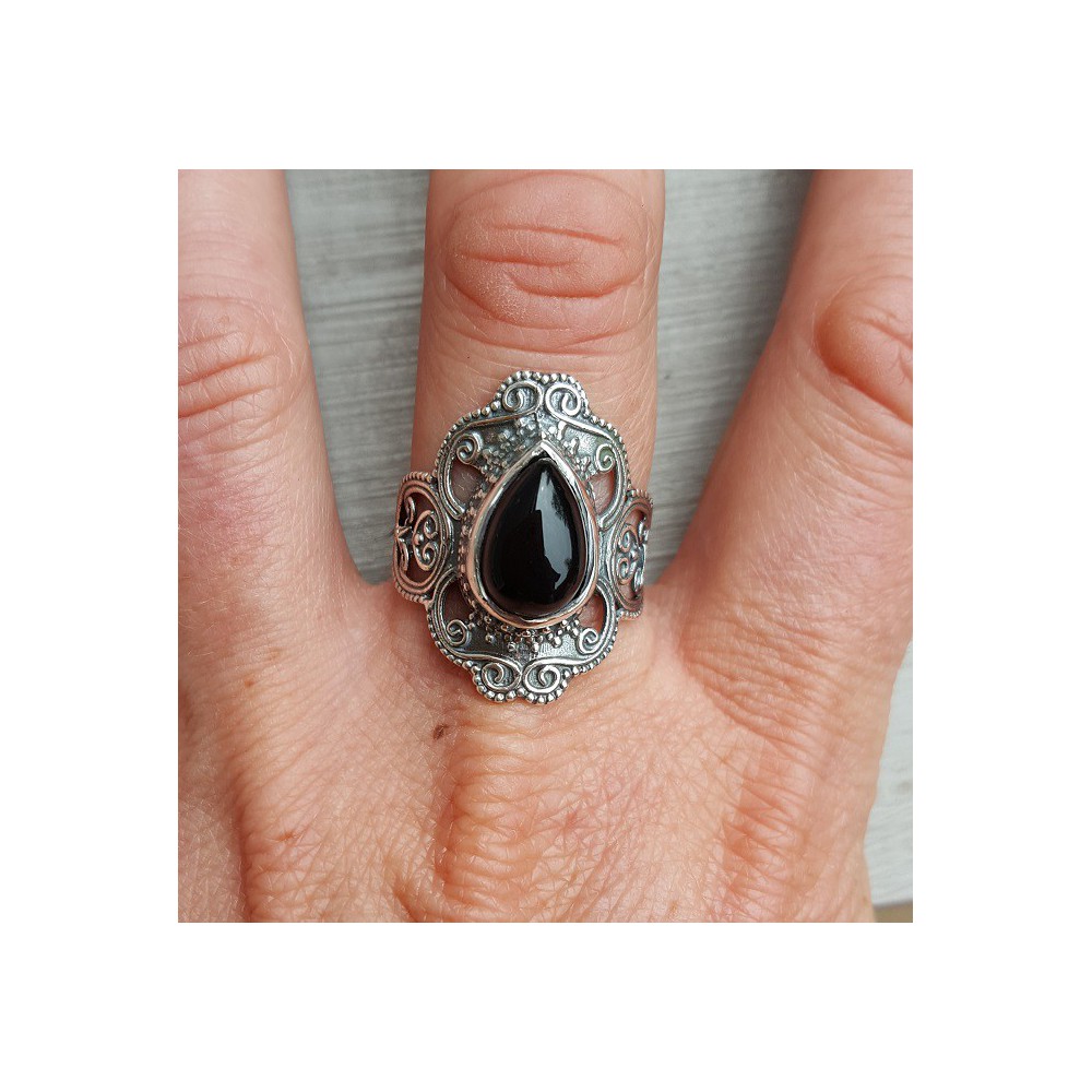 Silver ring set with black Onyx and carved head 17.7