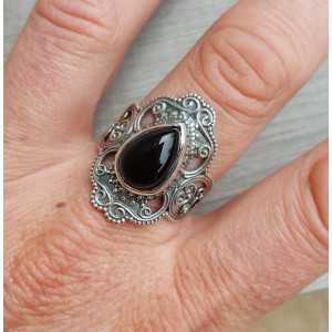 Silver ring set with black Onyx and carved head 17.7
