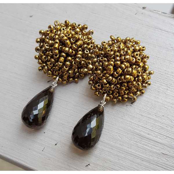 Earrings with oorknoppen of bronze and gold beads and Smokey Topaz