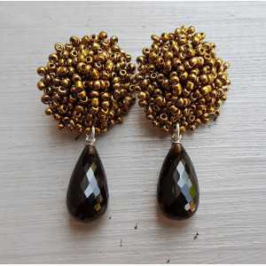 Earrings with oorknoppen of bronze and gold beads and Smokey Topaz