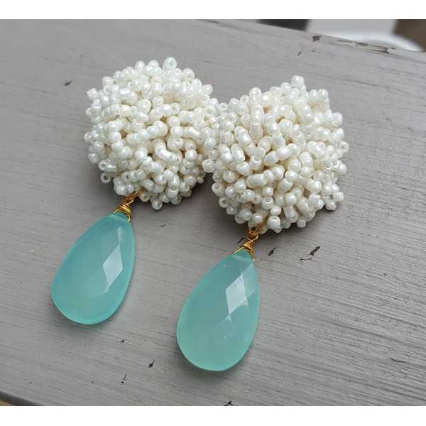 Earrings with oorknoppen of white beads and aqua Chalcedony briolet