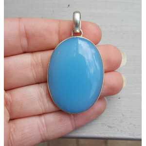 Silver pendant with oval blue Chalcedony