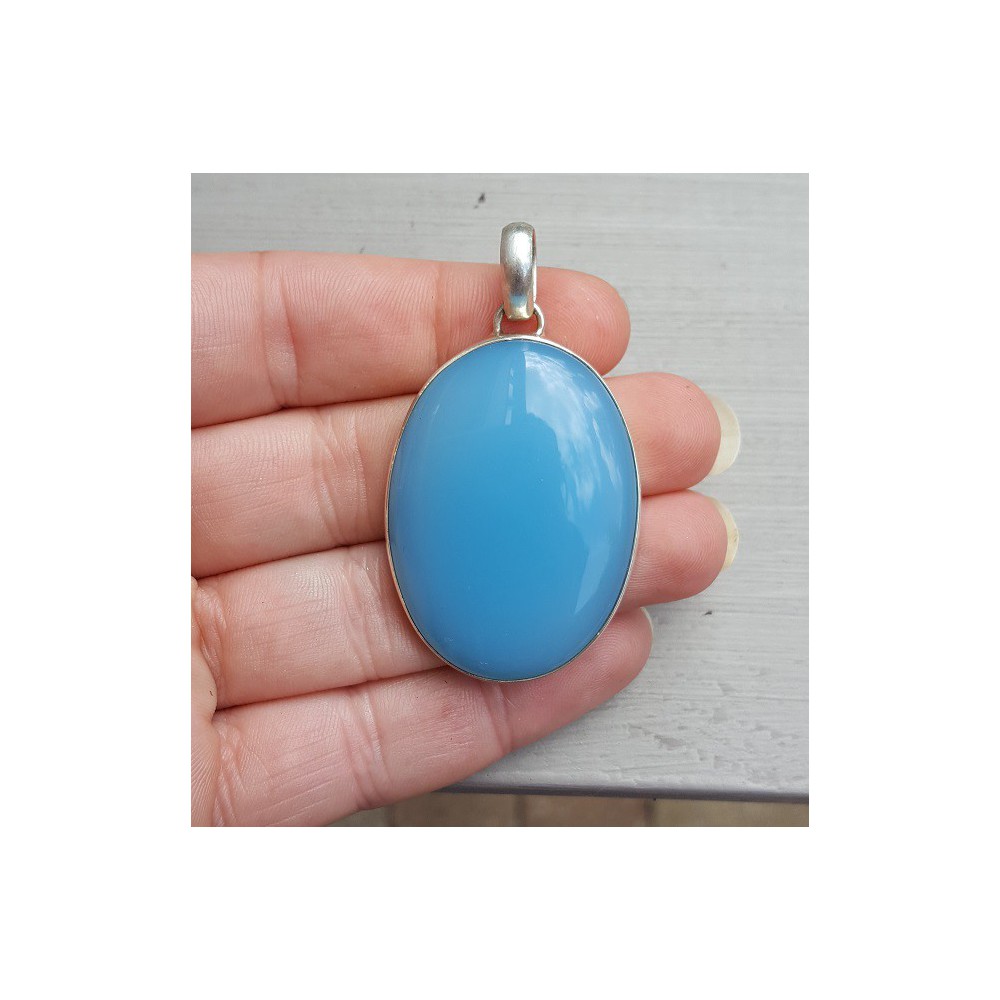 Silver pendant with oval blue Chalcedony