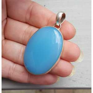 Silver pendant with oval blue Chalcedony