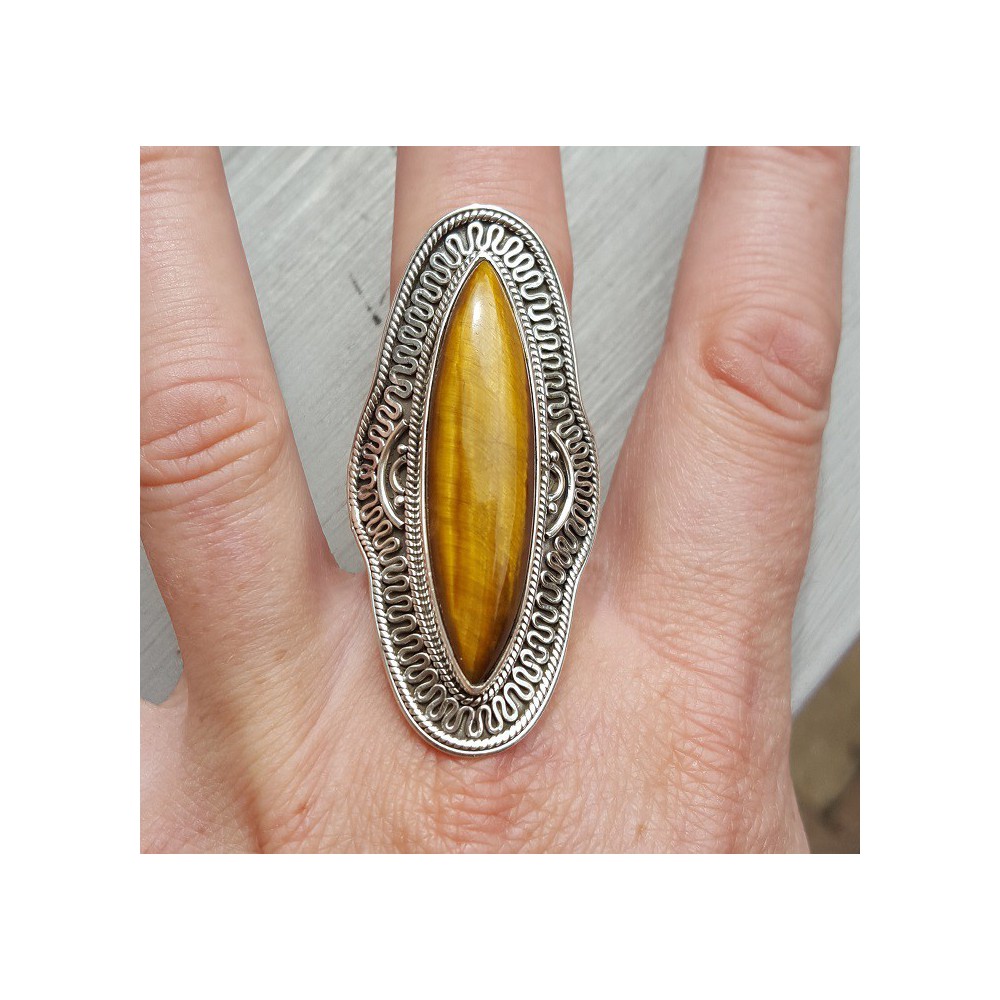 Silver ring set with marquise tiger's eye and carved head 18.5