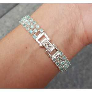 Silver bracelet set with three rows of Apatite