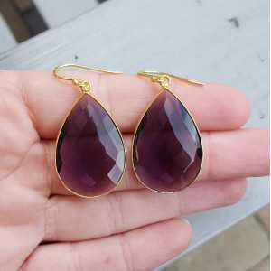 Gold plated earrings set with faceted Amethyst