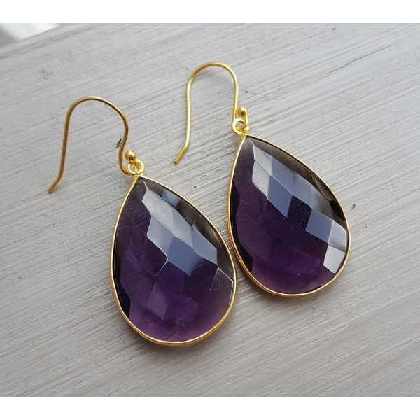 Gold plated earrings set with faceted Amethyst