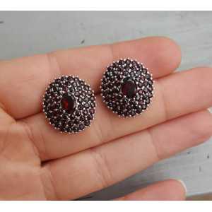 Silver earrings with round and oval faceted Garnets