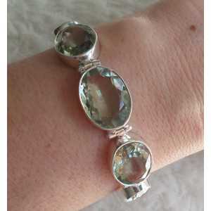 Silver bracelet set with facet cut green Amethyst