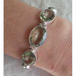 Silver bracelet set with facet cut green Amethyst