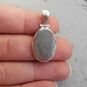 Silver pendant set with oval Gibeon Meteorite