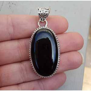 Silver pendant oval cabochon Onyx and carved setting