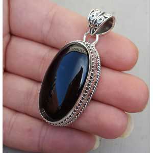 Silver pendant oval cabochon Onyx and carved setting