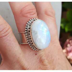 Silver ring set with rainbow Moonstone and machined head 19