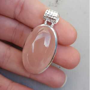 Silver pendant set with oval cabochon rose quartz