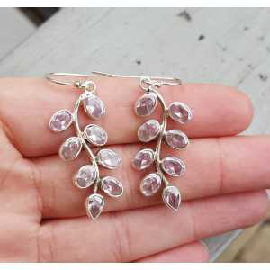 Silver earrings set with pink quartz