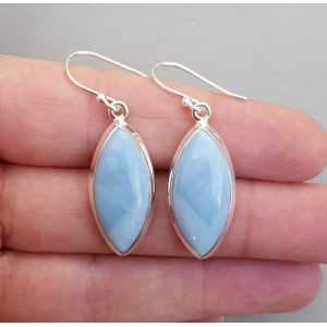 Silver earrings set with marquise blue Opal