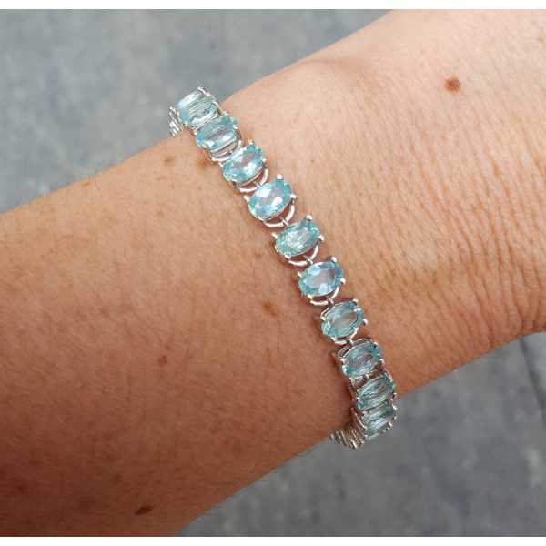 Silver bracelet set with oval facet cut Apatite