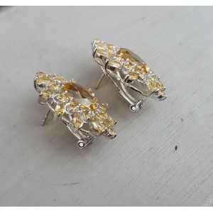 Silver earrings set with facet cut Citrine