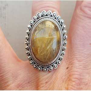 Zilveren ring met gouden Rutielkwarts en bewerkte kop 17 mm