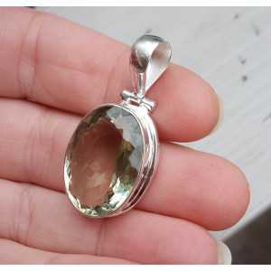 Silver pendant set with oval faceted green Amethyst