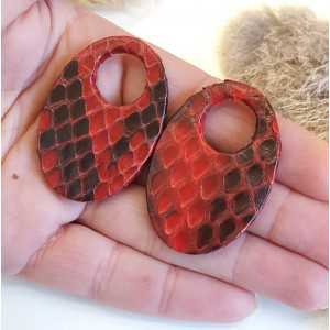 Creole earrings set with oval shaped pendant of dark red Snakeskin