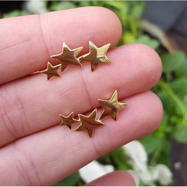 Gold plated earclimber with silver stars