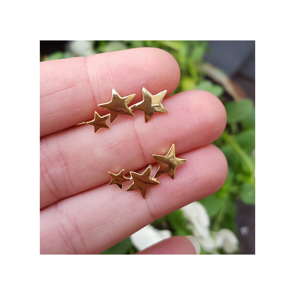 Gold plated earclimber with silver stars