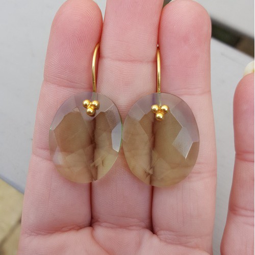 Vergulde oorbellen gezet met ovale groene Amethist