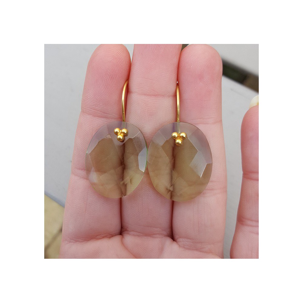 Gold plated earrings set with oval green Amethysts