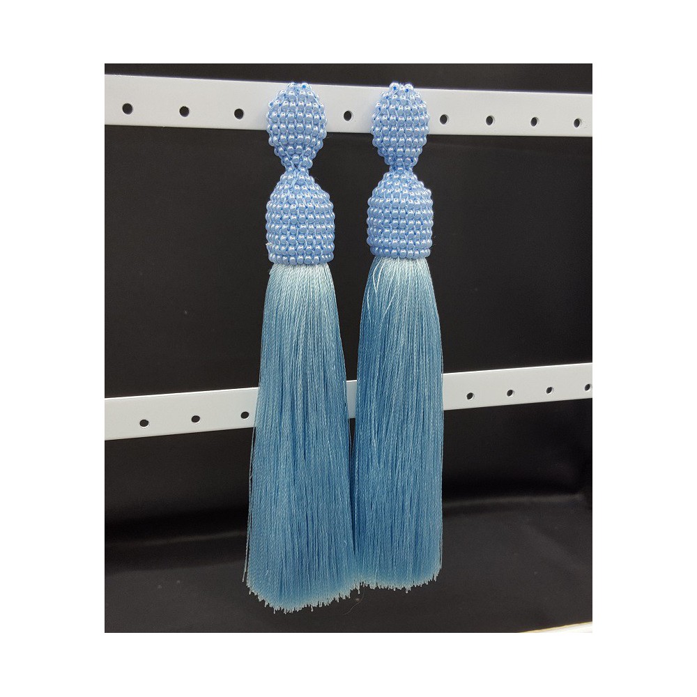 Licht blauwe tassel oorbellen