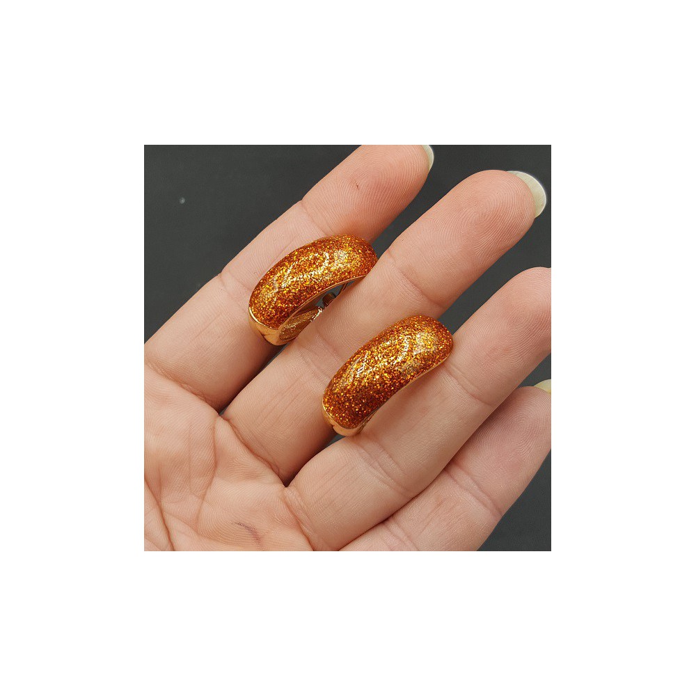 Gouden brede oranje glitter creolen