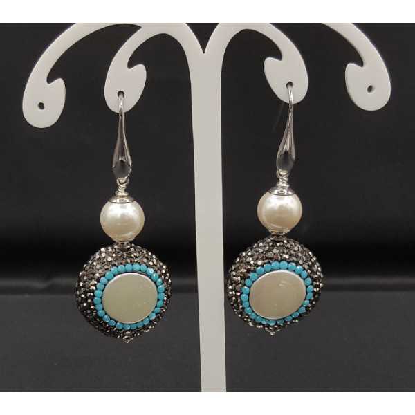 Ohrringe mit Perle, schwarz und Türkis-blau Kristalle
