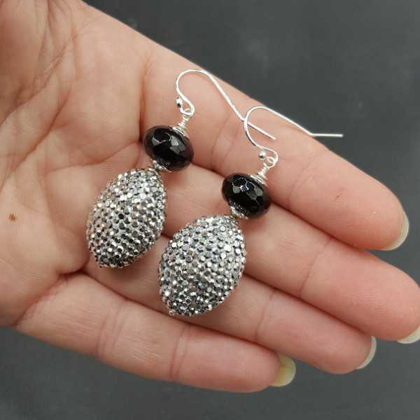 Zilveren oorbellen met zwarte Onyx en zilveren kristallen