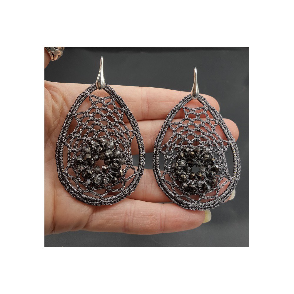 Earrings with grey pendant of silk thread and crystals