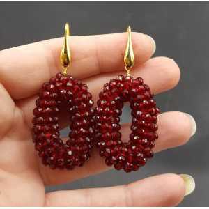 Gold plated earrings small oval pendant of Garnet red crystals