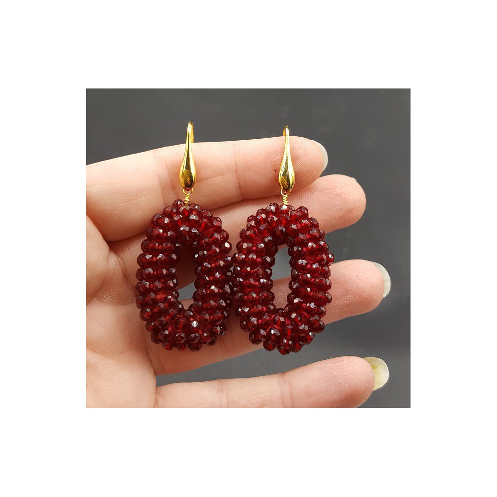 Gold plated earrings small oval pendant of Garnet red crystals