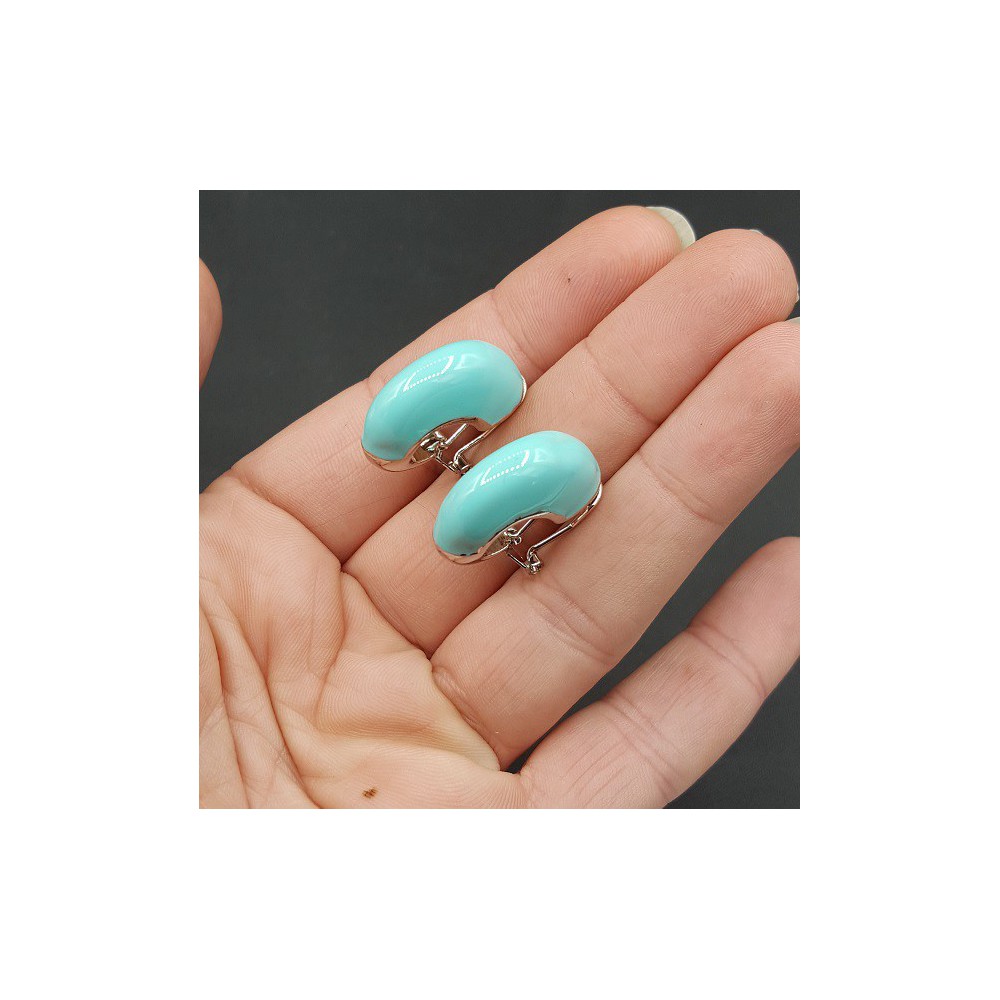 Brede zilverkleurige creolen turkoois blauw