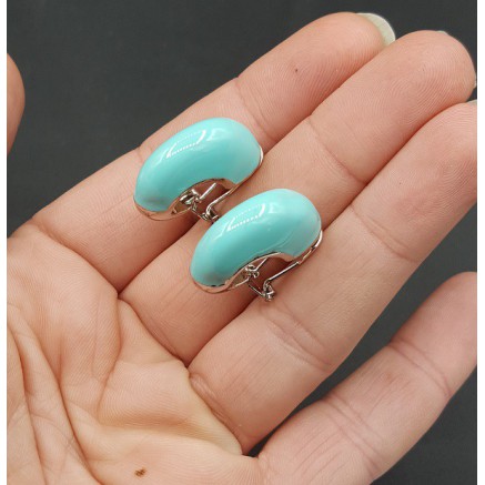 Brede zilverkleurige creolen turkoois blauw