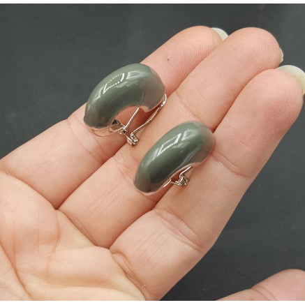 Brede zilverkleurige creolen grijs