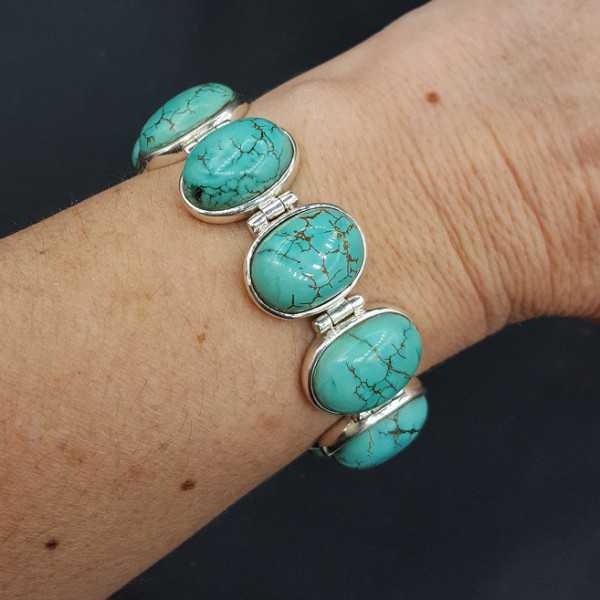 Silver bracelet with oval cabochon cut Turquoise links